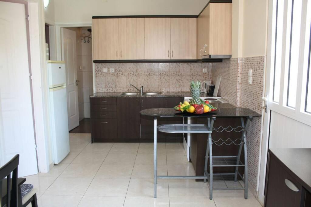 Iris'S Apartment Central With Parking 阿尔戈斯托利翁 外观 照片